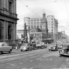 The Stock Exchange building stands in front of the Chief Post Office in 1952... "One of the most...