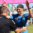 Eric Ross (66), of Hakataramea, greets Alps 2 Ocean Ultra race director Mike Sandri, of Oamaru,...