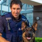 Constable Saunders and Police Dog Vann. Photo: Southern District Police Facebook