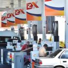 Customers line up at the Z Energy petrol station in Anderson's Bay Rd, Dunedin. Photo by Gerard O...