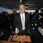 Australian PM Scott Morrison courts voters with sausages on the campaign trail in Tasmania. Photo...