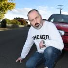 Dunedin resident Lesley Chave is not happy at the cracked condition of Aberdeen Rd, but the...