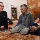 Enjoying the open day at Al Huda mosque in Dunedin yesterday are (from left) Charles Shaw, Essa...