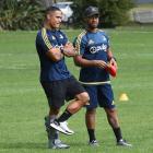 Highlanders and All Black halfback Aaron Smith (left) with Highlanders trainer Buxton Popoali'i...