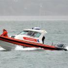 The Coastguard searches for a kayaker at Back Beach in Port Chalmers yesterday. Photo by Gerard O...