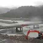 Work continues on the Bailey bridge across the Waiho River yesterday.PHOTO: NZTA

