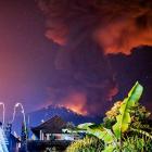 Thick smoke and glow from lava are seen as Mount Agung volcano erupts in Karangasem Regency, Bali...