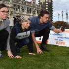 At the 350 Otepoti Dunedin Fossil Free Banks Challenge on Saturday are (from left) Olivia Heer,...