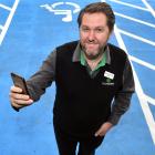 Countdown Dunedin South manager Grant McEwan tests the new Access Aware app on a freshly-painted...