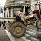 National MP Shane Ardern drives his tractor ``Myrtle'' up the steps of Parliament in September...
