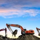Multiple backhoe diggers on a construction site. Photo: Getty Images 