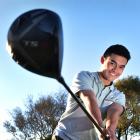 Young golfer Parker Aluesi at the St Clair Golf Club yesterday. Photo: Peter McIntosh