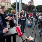 Education Minister Chris Hipkins fronting thousands of striking teachers, and their supporters,...