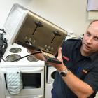 How to clean out a toaster was one of a host of kitchen fire prevention tips offered by East...