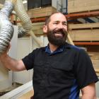 Ross Sutherland at Quality Doors in Dunedin yesterday, with a CNC router. Photo: Gregor Richardson