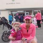 Bea and Izzy Tomlinson (21 months), of Dunback, get ready for the Palmerston Pink Ribbon Fun Run...