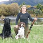 Enjoying day one of the duck-shooting season at Kingston is Laura Douglas and her dogs Ash (left)...