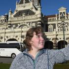 German backpacker Janne Sandmann takes a selfie yesterday afternoon in front of the Dunedin...