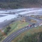 Work being done on the Waiho bridge following the March floods. Photo: Supplied via RNZ