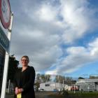 South West Autos Tapanui owner Racheal Hines wants the NZTA to move 50kmh signs further out of...