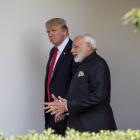 US President Donald Trump and Indian PM Narendra Modi speak during a bilateral meeting in...