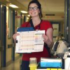 Dunedin Hospital senior nurse and clinical team co-ordinator Jen Marsh displays the new Early...