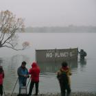 An unexpected surprise welcomed a group of tourists wanting to take a picture of the iconic Lake...