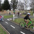 Children enjoy the new Palmerston kids bike park, which was officially opened yesterday. PHOTO:...