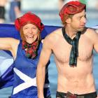 Proud Scots Karen Blackwood and Stephen Colpitts rise from the freezing waters of St Clair...