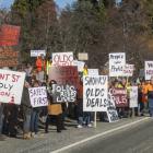 Kingston residents armed with placards called for ban on construction traffic from using the town...