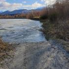 A 50m section of the Queenstown Trail, upstream from the Shotover Bridge, was washed out by heavy...