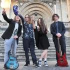 Velvet Strings band members (from left) Seth Fleming (15), Max White (15), Jayda Smither (14) and...