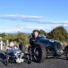 Jim Bennett and his great-granddaughter Arnikah Burke (3), of Dunedin, in an Impulse racing car...