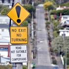 A Christchurch tour operator plans to continue taking a 12-seater vehicle up Baldwin St, despite...