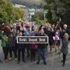 About 30 people attended a gathering on Dunedin's Baldwin St on Saturday to protest the world's...