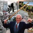 A three-bedroom house is hauled up Baldwin St in 1993; in 1988 Iain Clark became the first person...