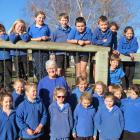 Millers Flat School teacher Lorna Skevington (pictured with her class) retires at the end of this...