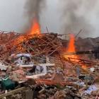 The burning remains of the Marble Court house. PHOTO: JAMES LOOYER
