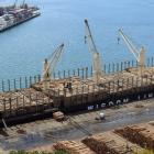 Logs  are loaded  on  Bunun Dynasty at Port Otago’s Beach St wharf, Port Chalmers. Photo: Stephen...