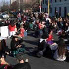 Protesters congregate at the intersection of Albany and Cumberland Sts in Dunedin at the end of...