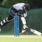 New Zealand’s Colin Munro sprints to make his ground in the warm-up T20 match against the Sri...