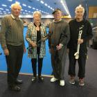 Rotary Club of Dunedin South president Jo Morshuis inspects bowling arms in Dunedin Lawn Bowls...