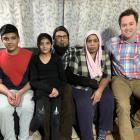 Relieved after learning Firoza Begum (second from right) will not be deported today are (from...