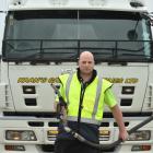 Kaan’s Catering Supplies driver Mike Sanders fills up at a local  fuel station in Dunedin after a...