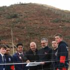 St Kevin’s College pupils (from left) Marc Boardman, Tai Williams and Jerome Misiloi look over...