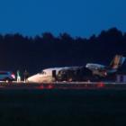 A private Cessna 560XL aircraft is seen after crashing while landing at Aarhus Airport in...