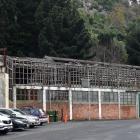 The former Sims Engineering building in Port Chalmers faces another winter without a roof. Photo:...