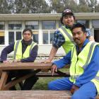 Dairy Farm Partnership employees (from left) Gil De Lima, Rhandall Montalba and Bernie Jaherol...