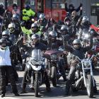 About 70 women motorcyclists gather at a North Dunedin service station to refuel and regroup...