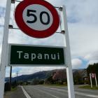 The controversial speed signs at the SH90 entrance to Tapanui from Gore. Photo: Richard Davison